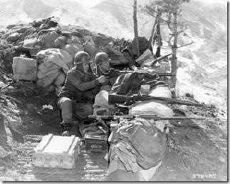SC 395485 - PFCs Canie and Wisch, man a machine gun along the front. 10 Mar 1952. Photograph - Hill