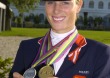 Zara Phillips with her individual gold medal and team silver medal - ©FEI